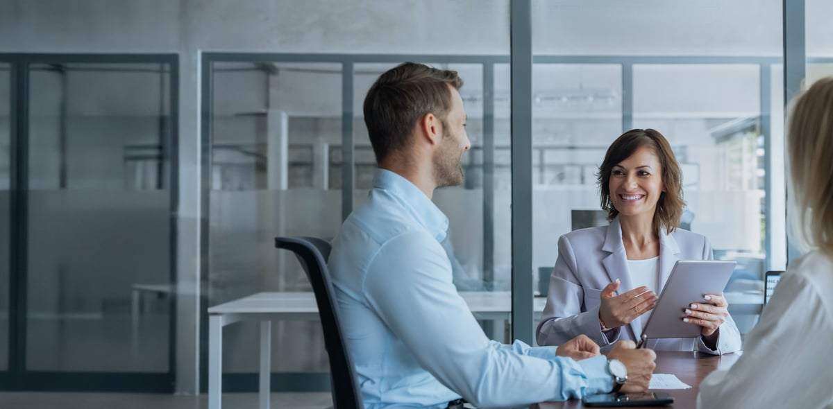 Consultant mentoring business owners through a strategy session